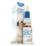 Eine Schachtel CBD-Pastillen für Katzen (1,3 mg) neben einer Flasche.